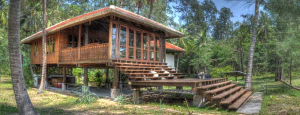 golden buddha house with sustainable hard wood source